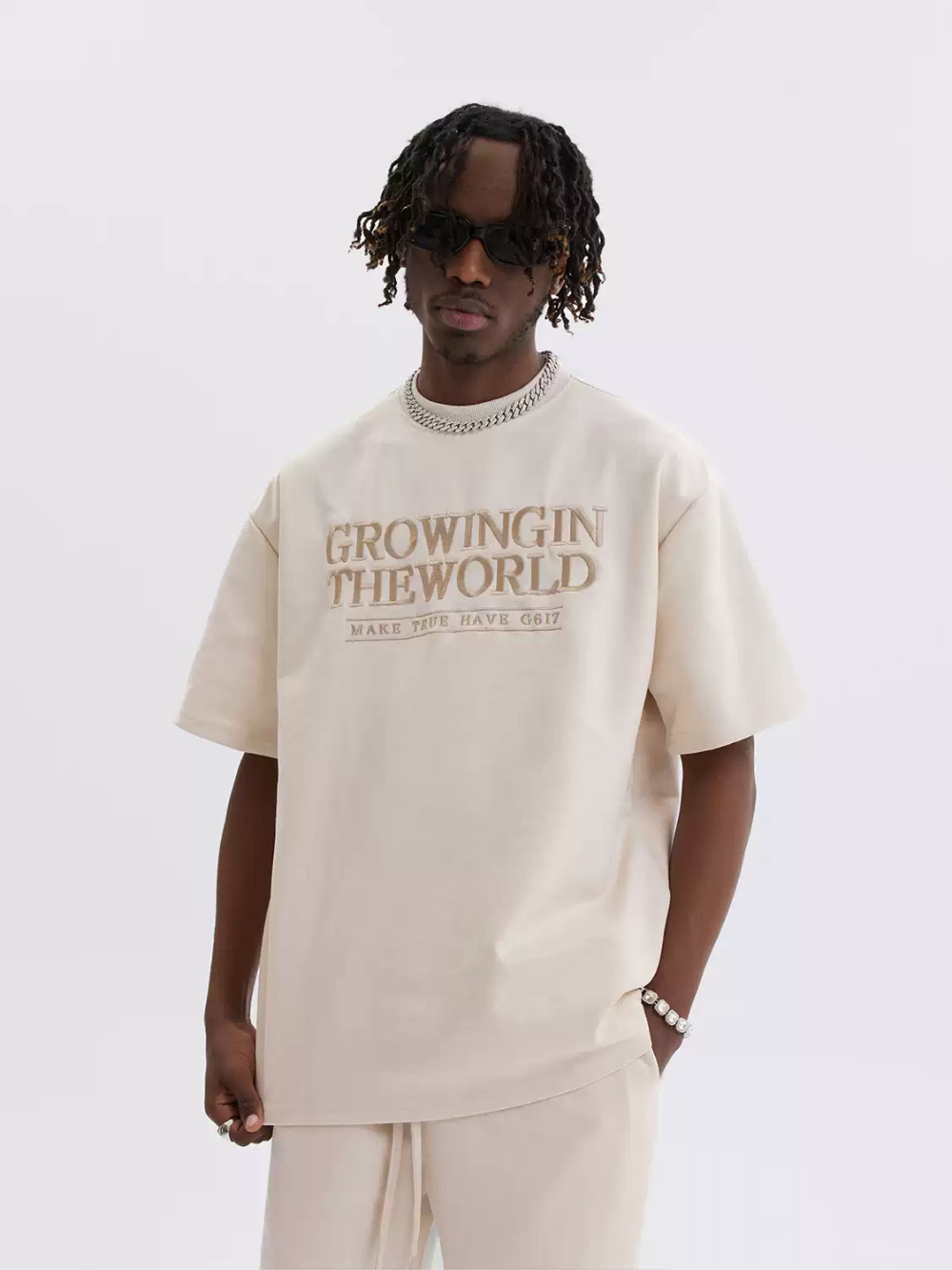 Growing In the world T-Shirt