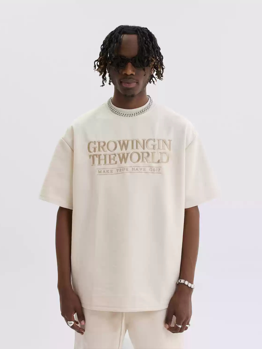Growing In the world T-Shirt