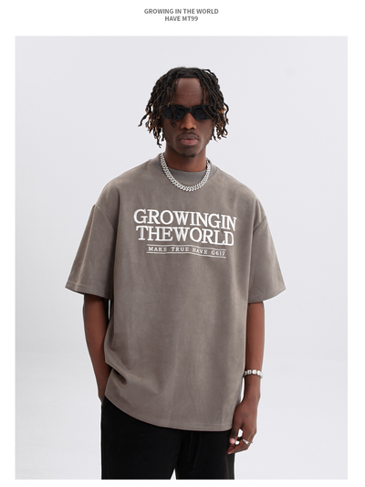 Growing In the world T-Shirt