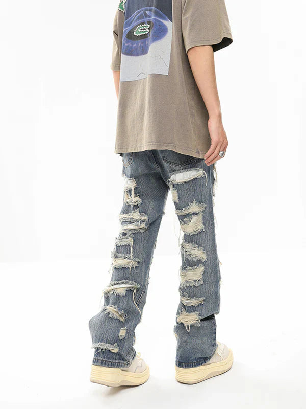 Jeans With Ripped Design